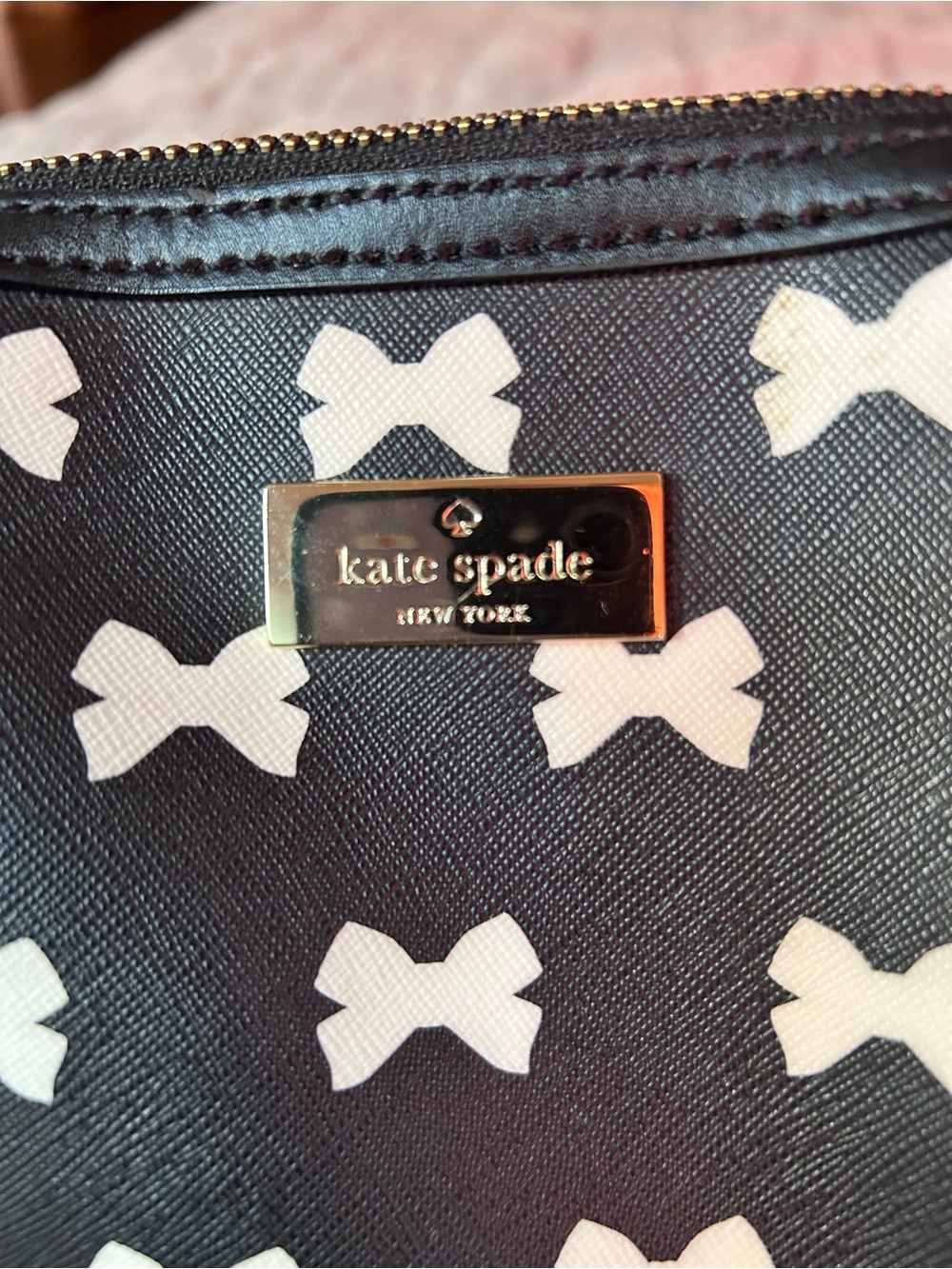 kate spade black cosmetic pouch with white bow print